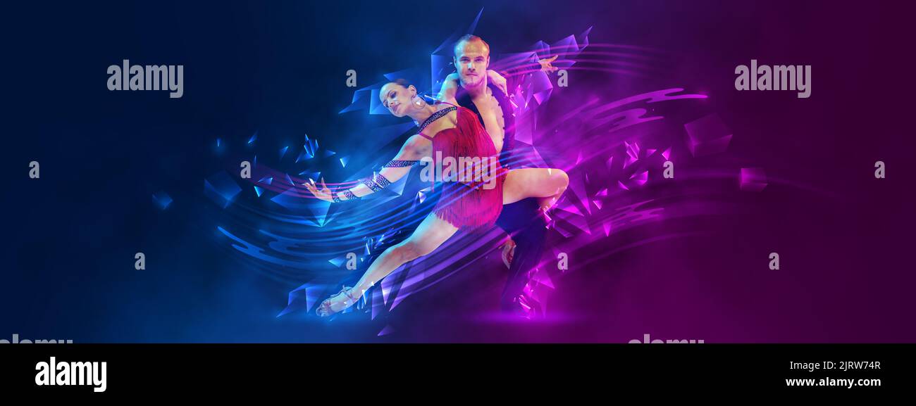 Emotional couple of dancers dancing samba, rumba, paso doble over dark background with neon fluid elements. Art, beauty, dance concept Stock Photo