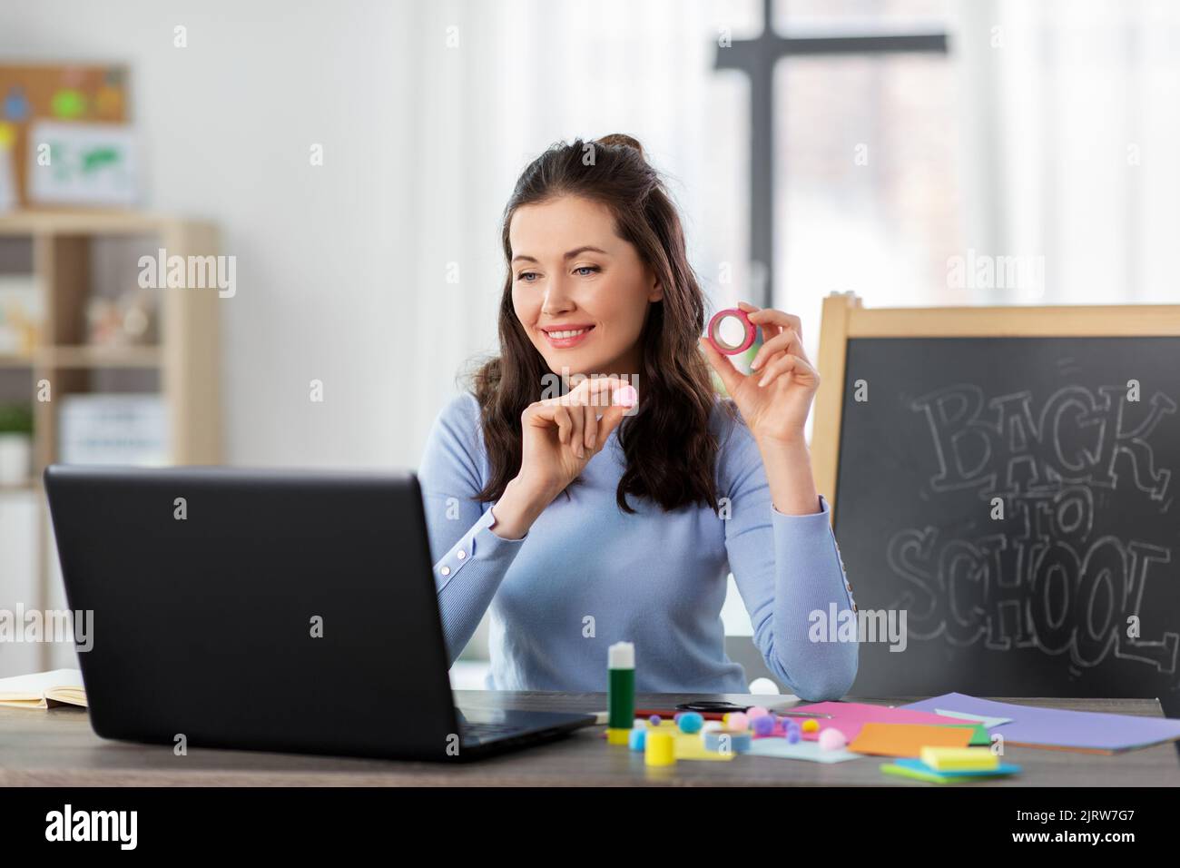 teacher having online class of arts and crafts Stock Photo Alamy