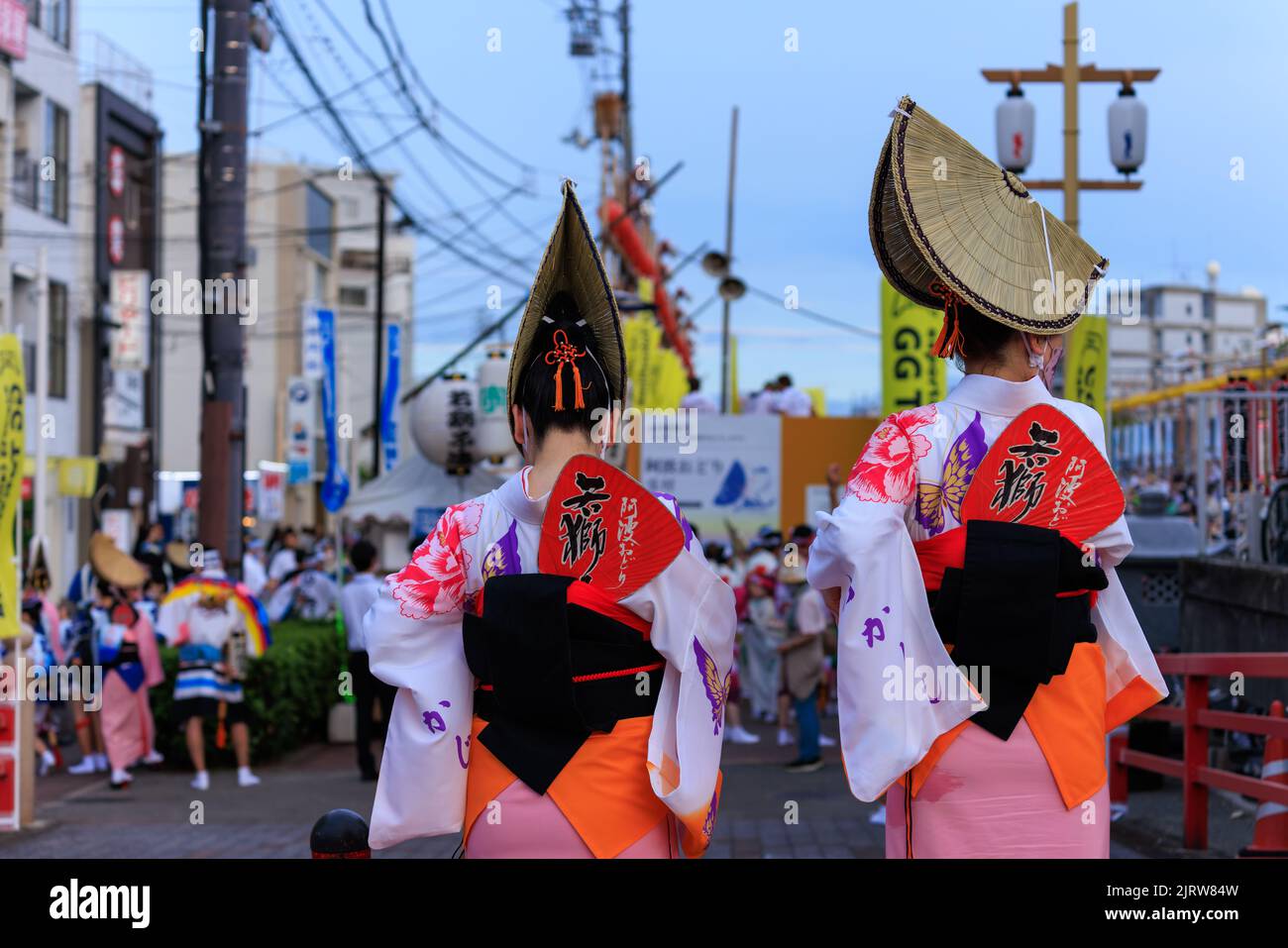 Two women in traditional hats and kimonos at Awaodori festival in Tokushima, Japan Stock Photo