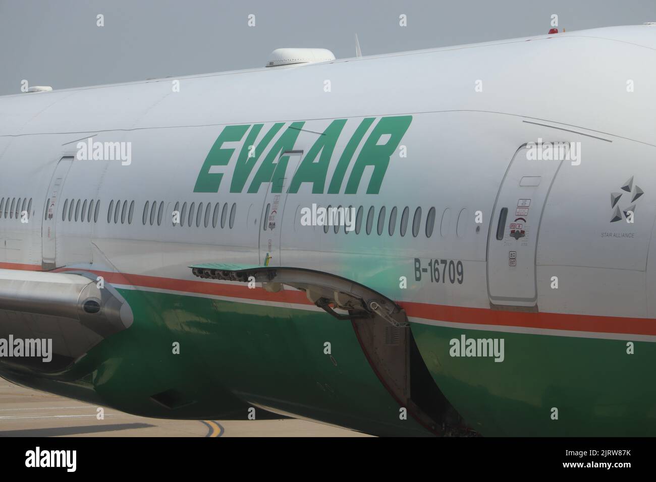 The aircraft body of EVA Air Boeing B777-300ER in Shangai Pudong Airport, China Stock Photo