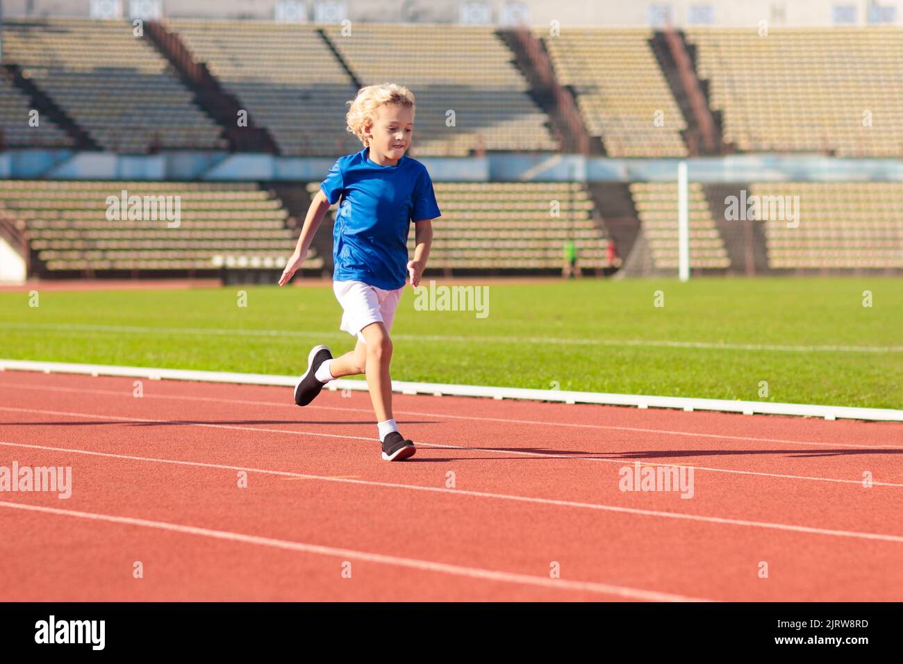 Fitness Athletic Girl Preparing For A Run On Sport Track At Stadium.  Healthy And Sporty Lifestyle With Young Girl Running Stock Photo, Picture  and Royalty Free Image. Image 39507034.
