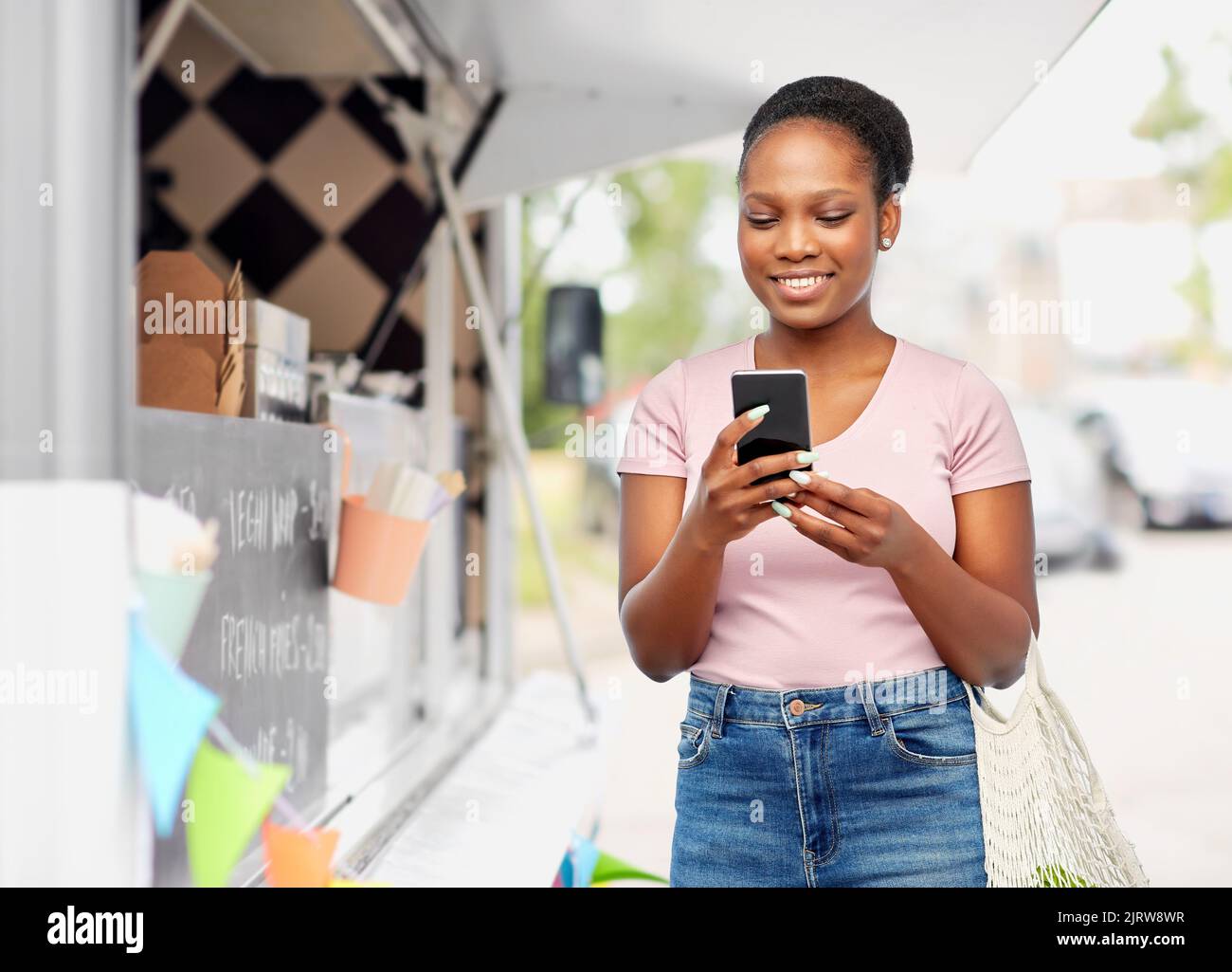 Woman mobile phone over green hi-res stock photography and images - Alamy
