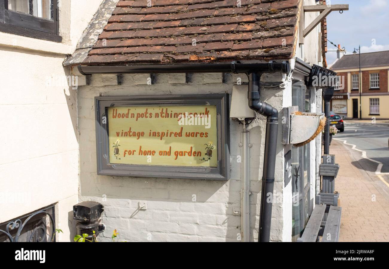 Quirky shop sign in Storrington a small town in the Horsham District of West Sussex, England Stock Photo