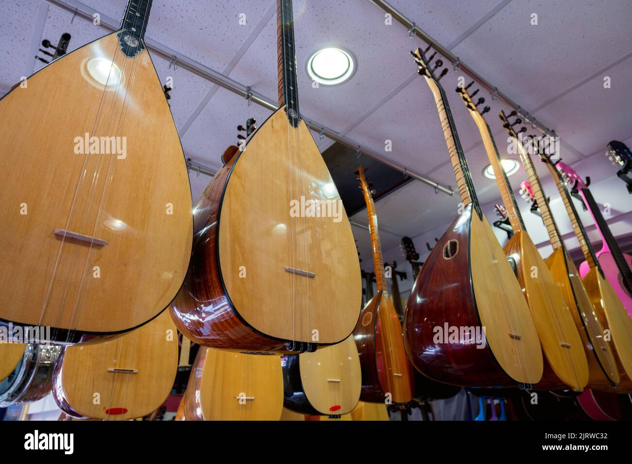 Istanbul, Turkey 2022. Rows of Turkish ethnic string instruments saz