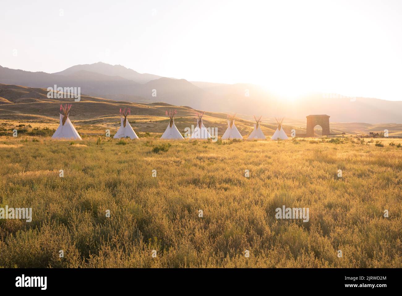 Madison Junction, United States of America. 17 August, 2022. Native American teepee lodges at the All Nations Teepee Village at the North Entrance to mark the 150th anniversary of Yellowstone National Park August 17, 2022 in Madison Junction, Montana. The project by Mountain Time Arts features 13 teepee lodges that signify a new era of Indigenous inclusion and representation in Yellowstone National Park. Credit: Jacob W. Frank/NPS/Alamy Live News Stock Photo