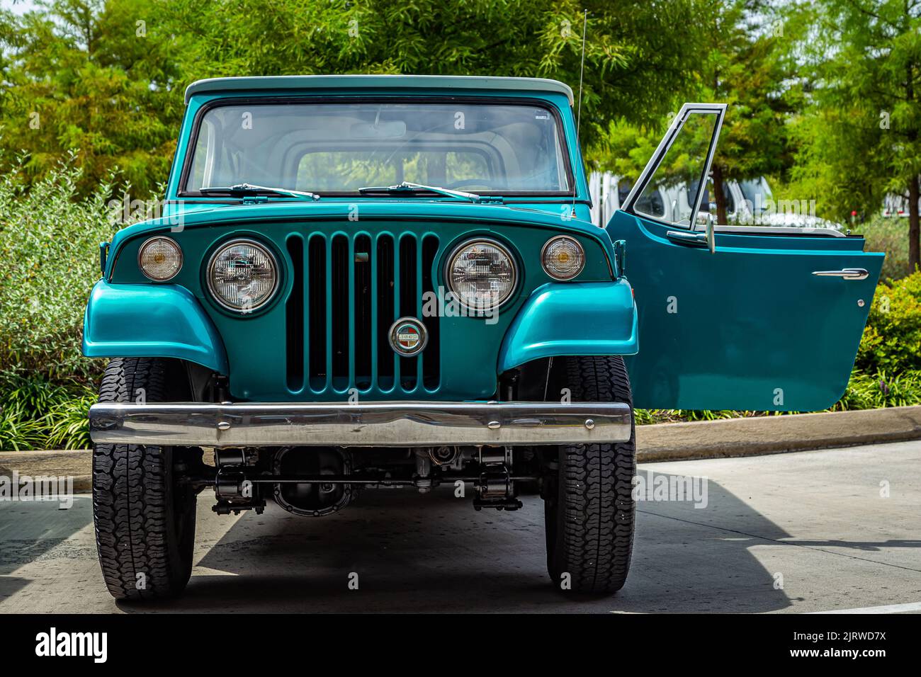 Pigeon Forge, TN - August 25, 2017: Low perspective front view of a Kaiser Jeep Jeepster Commando Station Wagon at a local enthusiast rally. Stock Photo