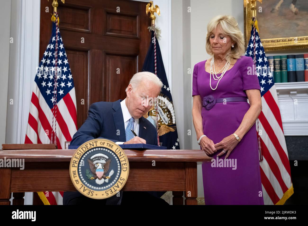 President Joe Biden, joined by First Lady Jill Biden, signs gun safety bill S. 2938, the Bipartisan Safer Communities Act, Saturday, June 25, 2022, in the Roosevelt Room of the White House. (Official White House Photo by Erin Scott) Stock Photo