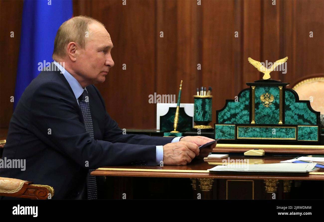Moscow, Russia. 26th Aug, 2022. Russian President Vladimir Putin holds a face-to-face meeting with the newly appointed chairman and CEO of Aeroflot, Sergei Alexandrovsky, at the Kremlin, August 26, 2022 in Moscow, Russia. Credit: Mikhail Klimentyev/Kremlin Pool/Alamy Live News Stock Photo