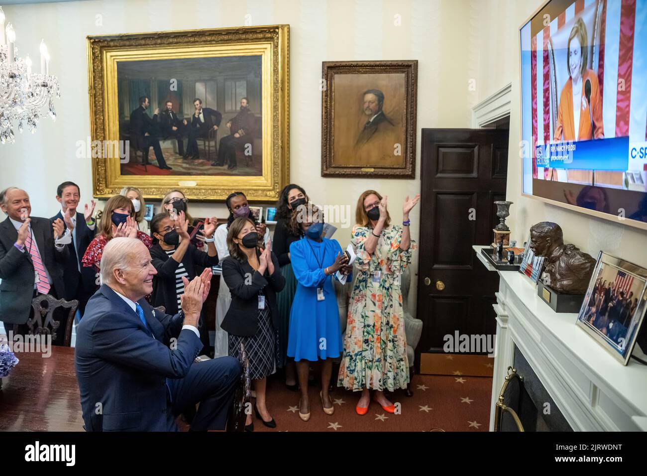 President Joe Biden, joined by senior advisers, watches the House vote and pass a gun reform bill, Friday, June 24, 2022, in the Oval Office Dining Room of the White House. (Official White House Photo by Adam Schultz) Stock Photo