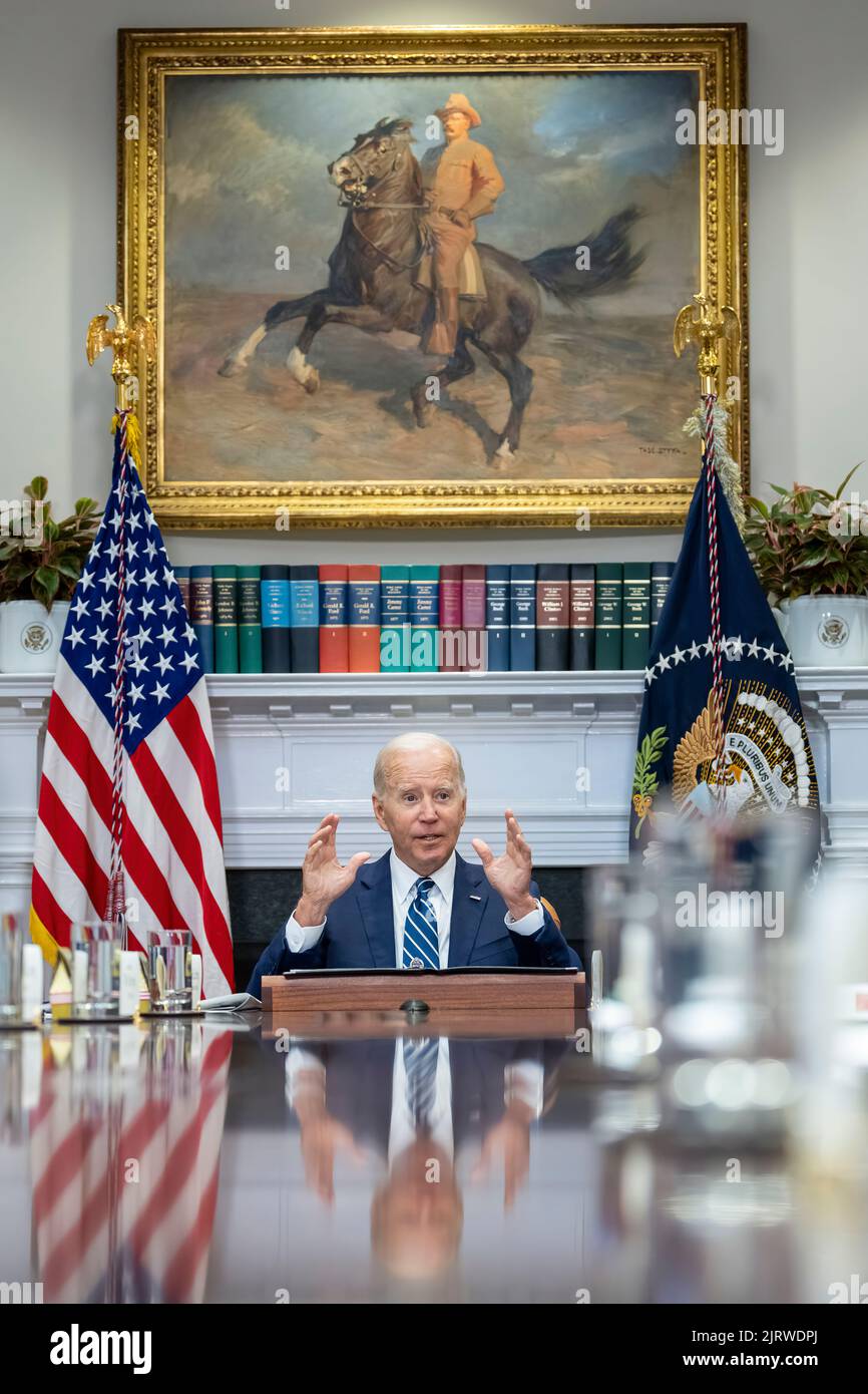 President Joe Biden drops by a meeting on the Federal-State Offshore Wind Implementation Partnership, Thursday, June 23, 2022, in the Roosevelt Room of the White House. (Official White House Photo by Adam Schultz) Stock Photo