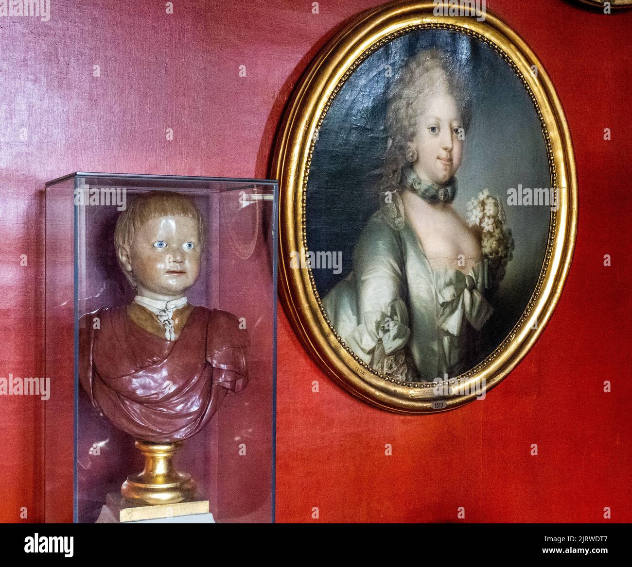 Portrait of young Queen Caroline Mathilde alongside a wax bust of Carl playmate of her son Frederik VI in Rosenborg Slot Copenhagen Denmark Stock Photo