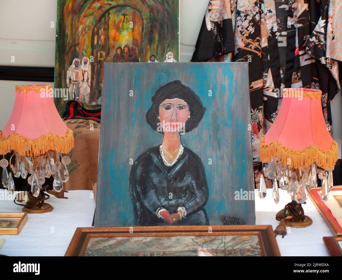 A painting for sale at the market in Saint-Chinian, Languedoc-Rousillon, France Stock Photo