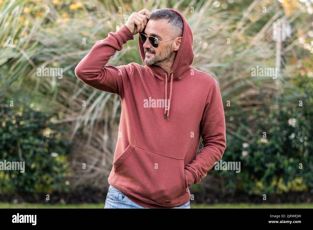 Man with a hoodie hi-res stock photography and images - Alamy