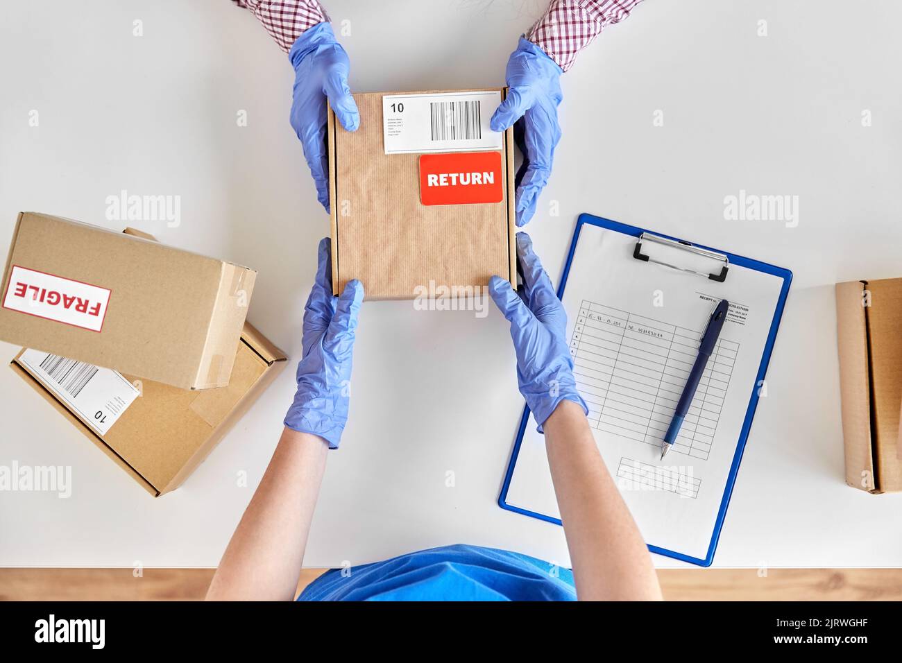 customer making return of parcel or purchase Stock Photo Alamy