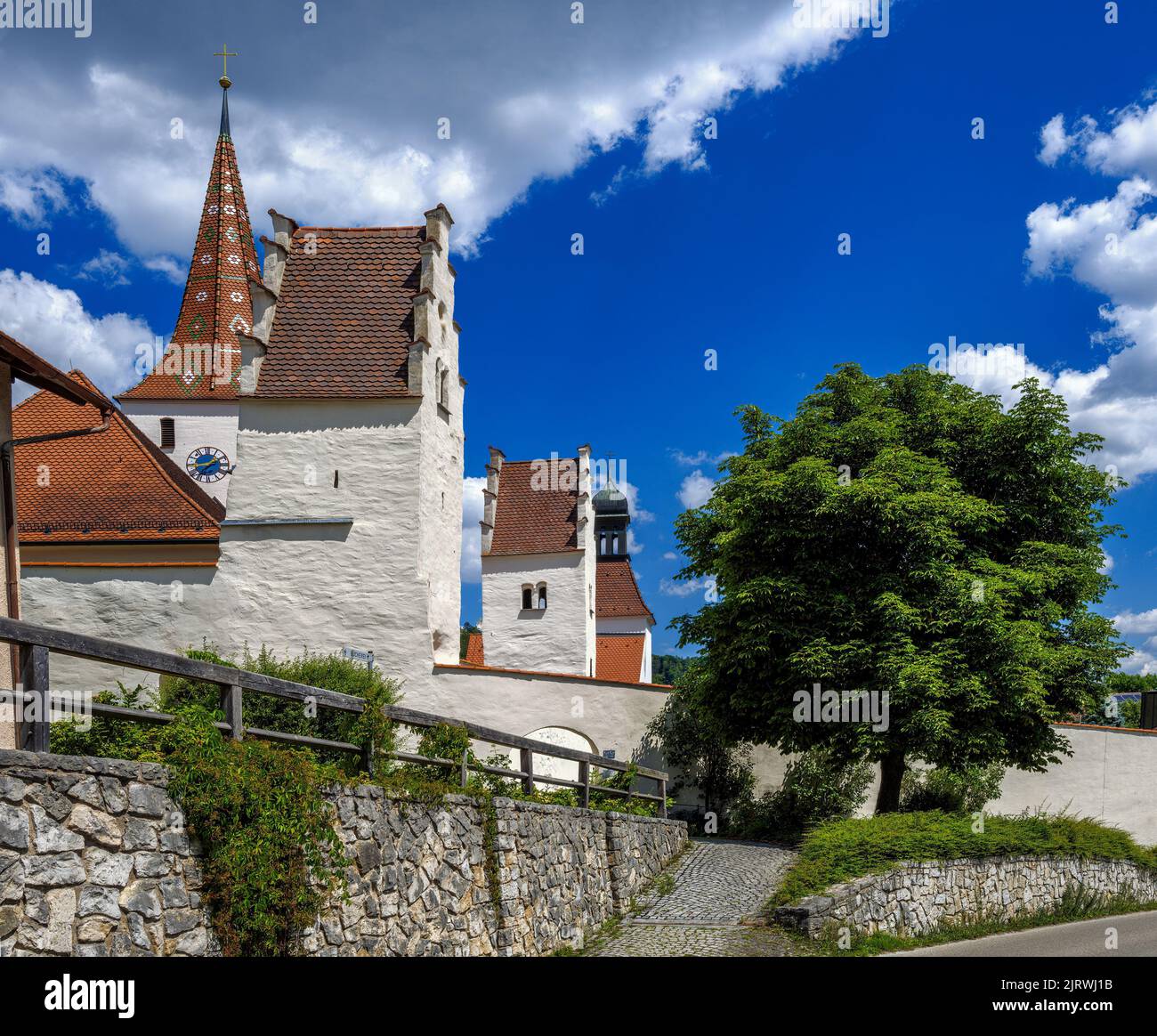 Historic fortified church of the village Kinding Stock Photo