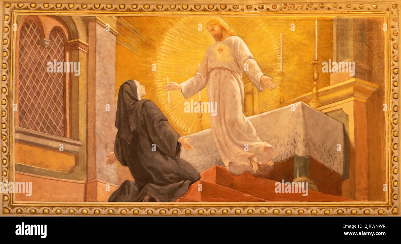 VARALLO, ITALY - JULY 17, 2022: The fresco Apparition of  Divine Mercy of Jesus in the church  Chiesa di sant Antonio by C. Secchi from 20. cent. Stock Photo