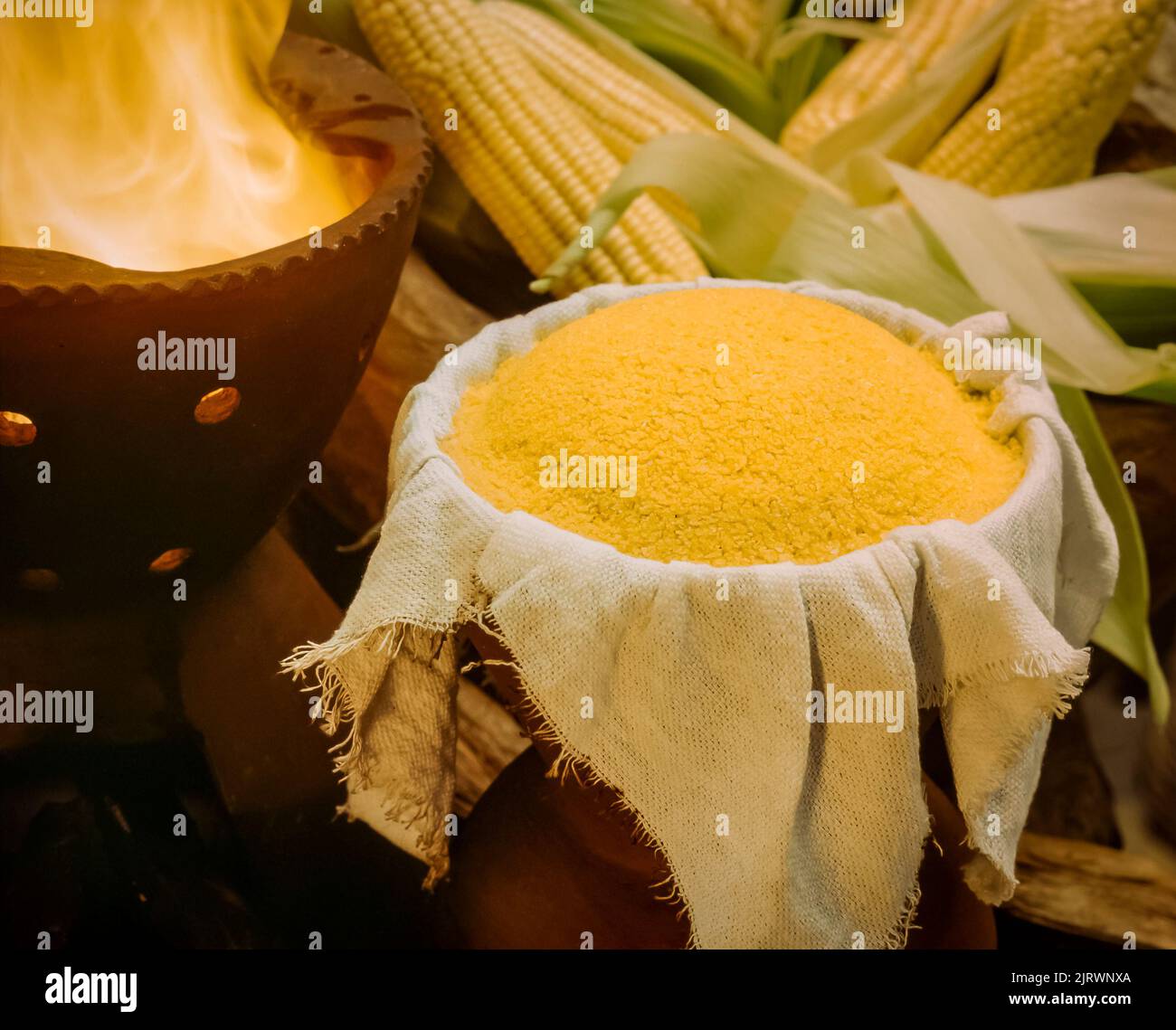 Corn couscous made the old fashioned way in clay pot with blurred