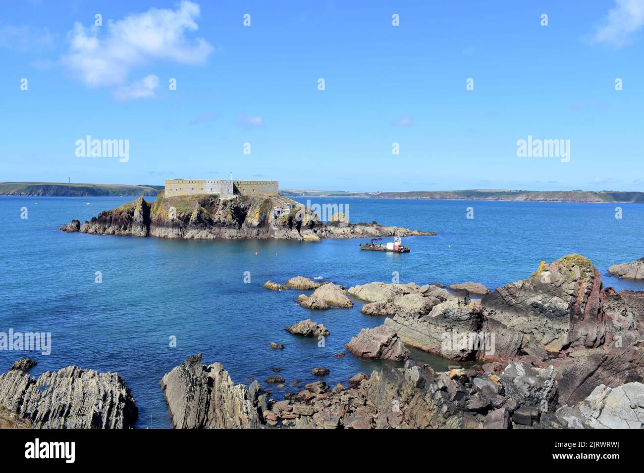 Thorne island and view across Milford Haven waterway, Angle, Pembrokeshire, Wales Stock Photo