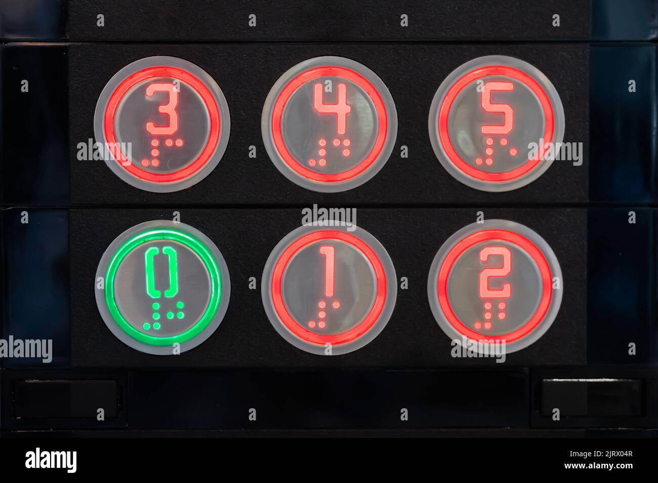 Elevator floor buttons on lift control panel at mall, hotel or business