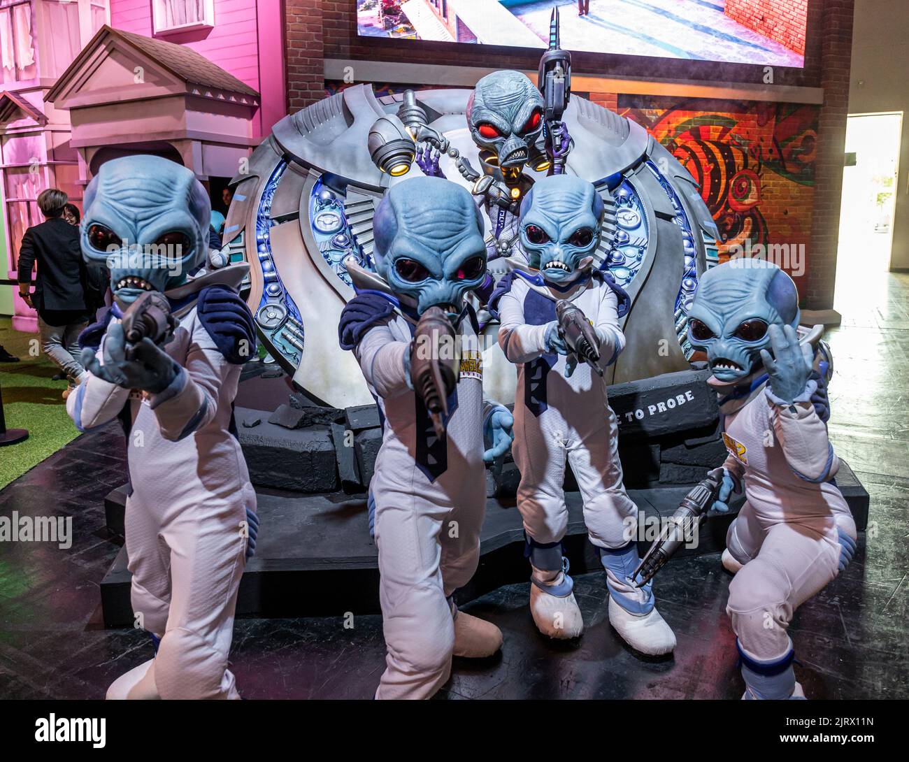 Cologne, Germany. 24th Aug, 2022. Gamescom 2022: Actors in alien costumes promote the remake of the action-adventure video game Destroy all Humans! 2 - Reprobed, remake developed by Black Forest Games, published by THQ Nordic. Gamescom is the world's largest trade fair for computer and video games, at Koelnmesse in Cologne, Germany. Photocredit: Christian Lademann / lademann.media Stock Photo