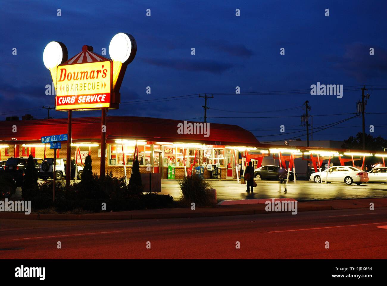 A sign for Doumar's, a classic drive in diner in Norfolk, Virginia is illuminated at night Stock Photo