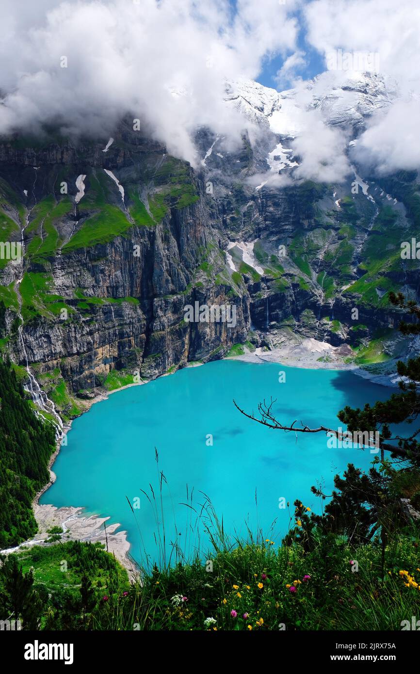 Oeschinen Lake (Oeschinensee) in  Kandersteg, the Bernese Oberland, Switzerland, part of the UNESCO World Heritage Site Stock Photo