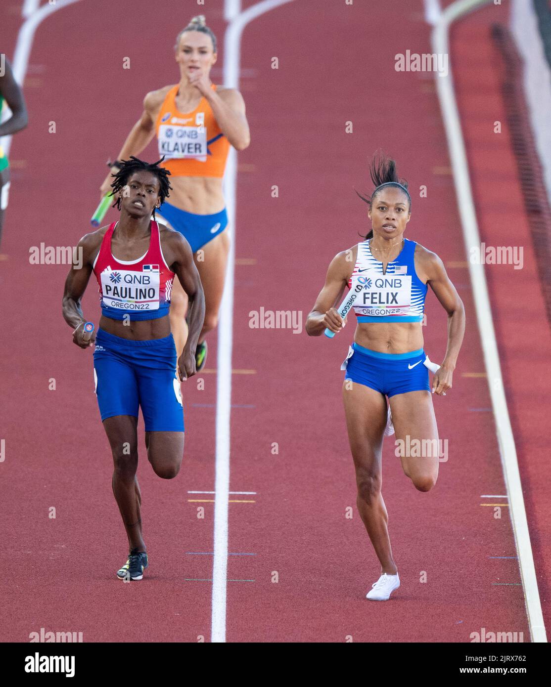 Marileidy Paulino and Allyson Felix competing in the mixed relay final