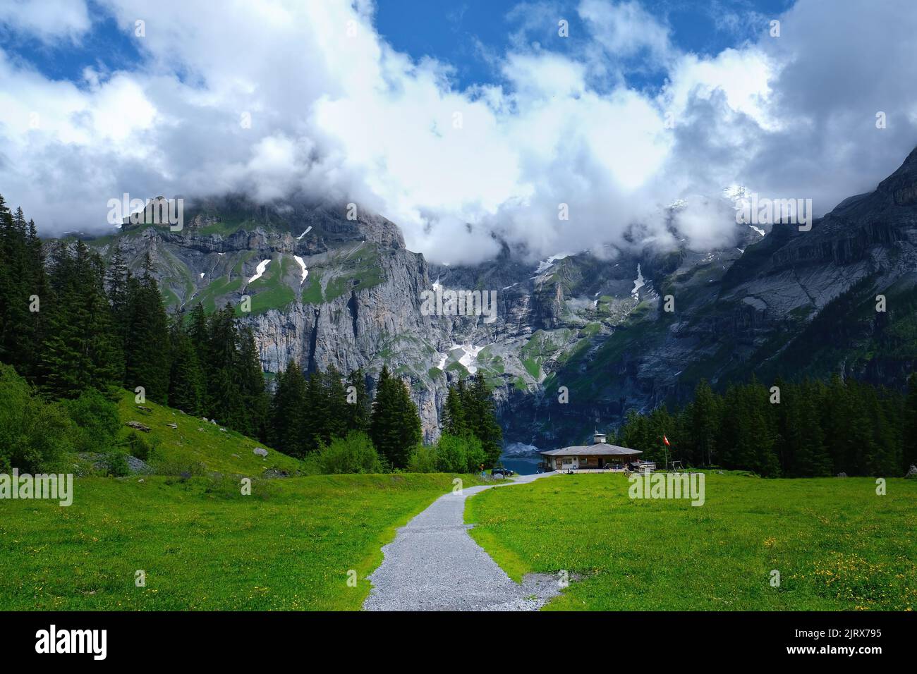 The road to Oeschinen Lake (Oeschinensee) in  Kandersteg, the Bernese Oberland, Switzerland, part of the UNESCO World Heritage Site Stock Photo