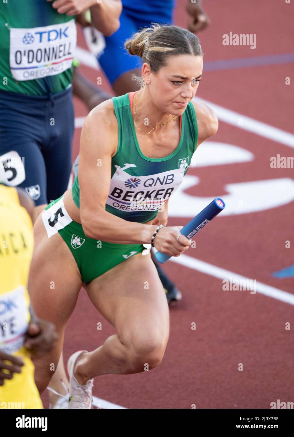 Sophie Becker competing in the mixed relay final at the World Athletics