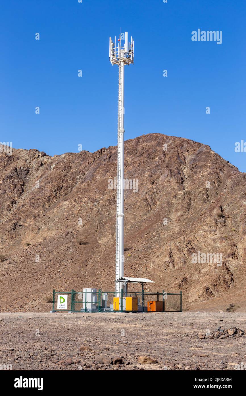 Wadi Shawka, UAE, 10.12.2020. GSM telecommunication antenna (cell tower) of Etisalat in Wadi Shawka, Hajar Mountains, United Arab Emirates. Stock Photo