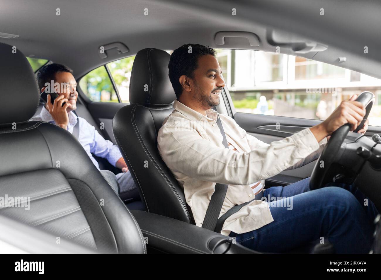 male passenger calling on smartphone in taxi car Stock Photo Alamy