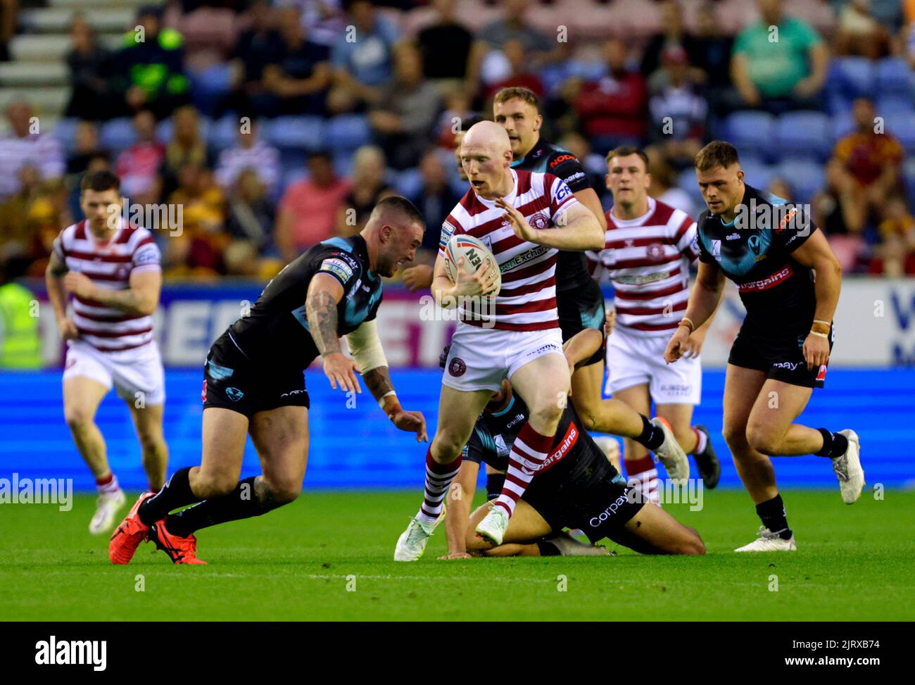 Wigan Warriors' Liam Farrell (centre) in action during the Betfred ...