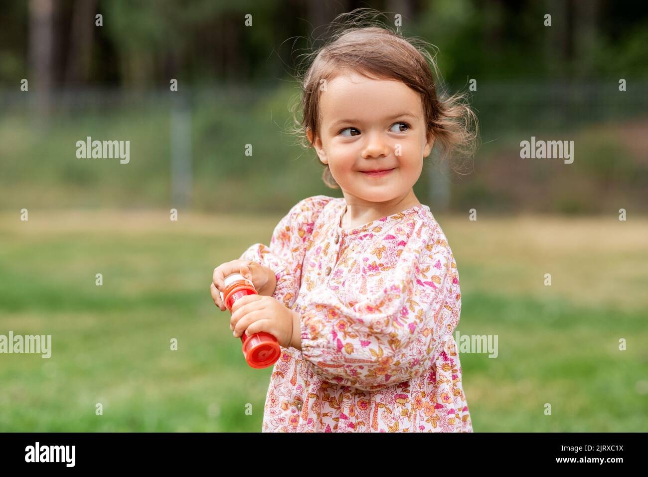 happy baby girl with soap bubble blower in summer Stock Photo - Alamy