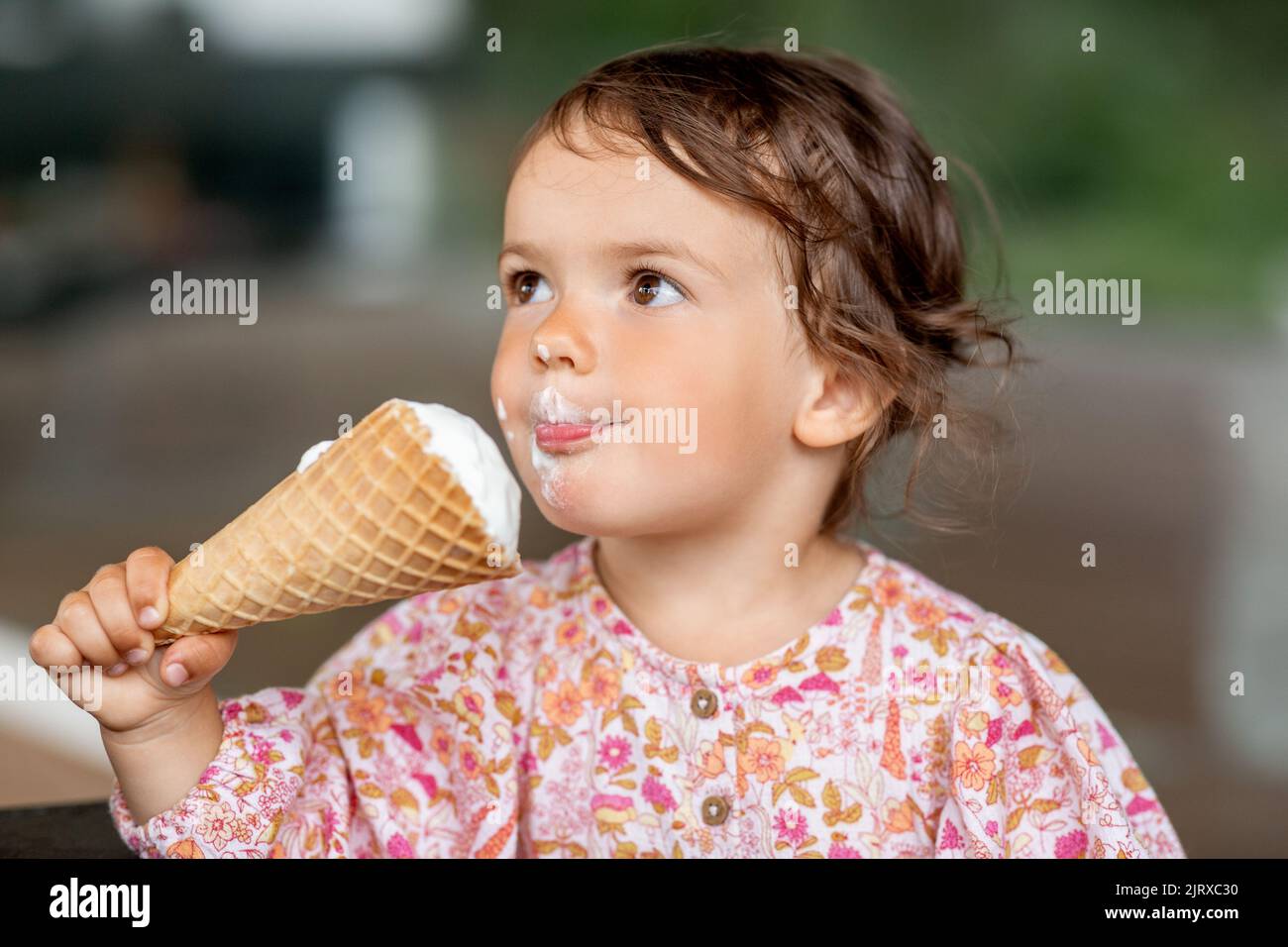 Lovely girl eating ice cream hires stock photography and images Alamy