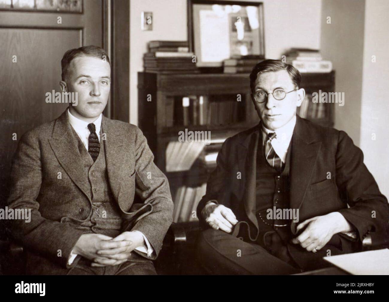FREDERICK BANTING (1891-1941) Canadian medical researcher about 1924 at right with co-discoverer of insulin Charles Best about 1925 Stock Photo
