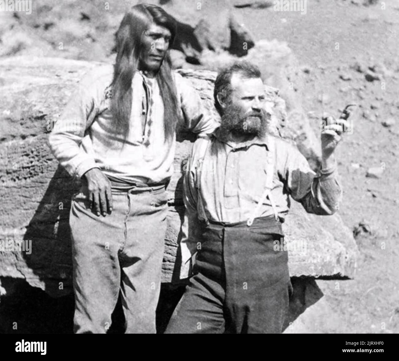 JOHN WESLEY POWEL in AL (1834-1902) American geologist  and explorer at right in Arizona about 1871 with Tau-hu, Headman of the Southern Paiute. Stock Photo