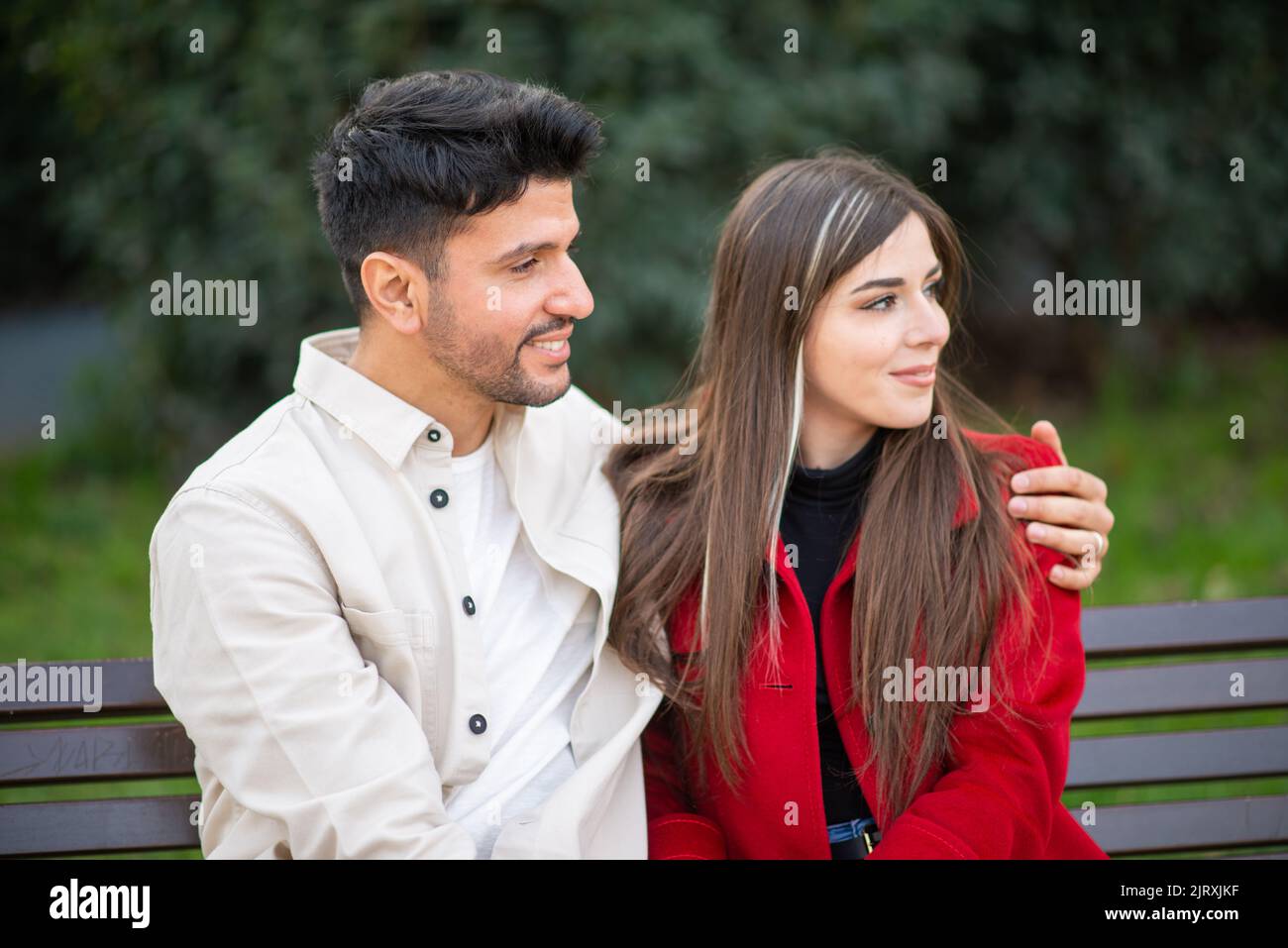 Arab man sitting on park bench hi-res stock photography and images - Alamy