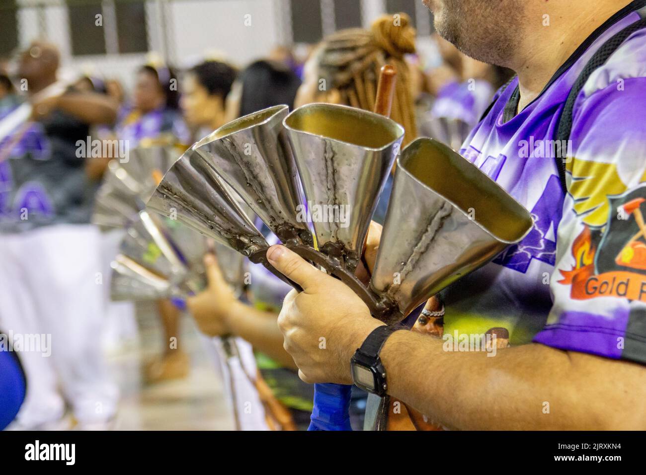 Components of the School of Samba portela with the agogô instrument, Marques de Sapucai, Rio de