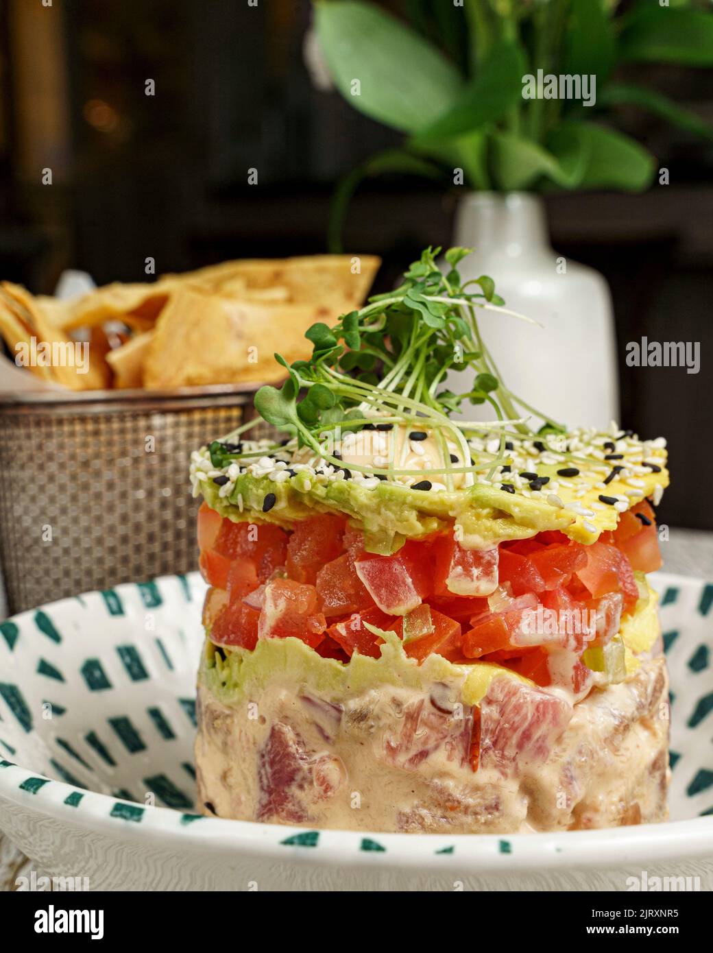 A tuna tartare with the pita chips on the background Stock Photo Alamy