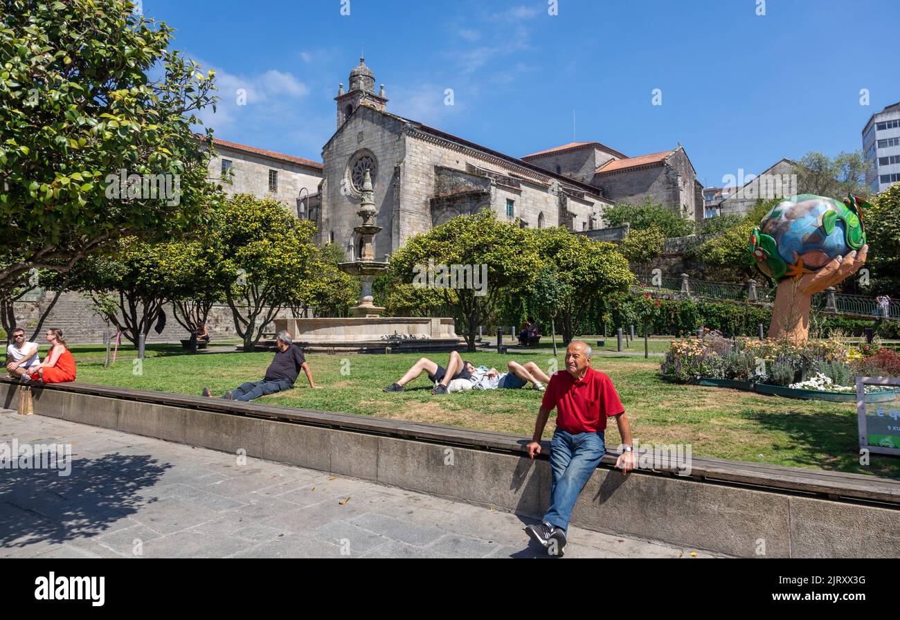 People sitting by the Park in central Pontevedra Galicia Spain Stock Photo