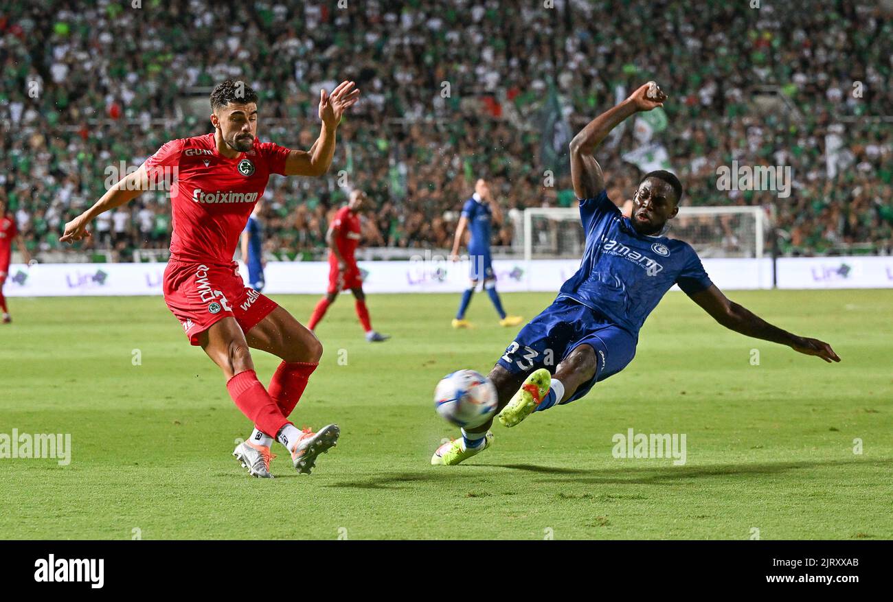 Omonia's Panagiotis Zachariou and Gent's Jordan Torunarigha fight for the ball during a soccer game between Cypriot Omonia Nicosia and Belgian KAA Gent in Nicosia, Cyprus on Thursday 25 August 2022, the return leg of the play-offs for the UEFA Europa League competition. BELGA PHOTO DAVID CATRY Stock Photo