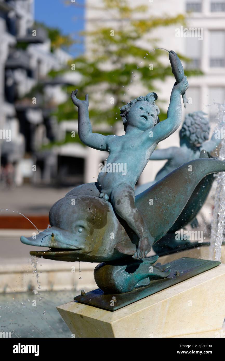 Cologne, Germany August 25, 2022: Gerling fountain in cologne cherub riding on dolphin by Arno Breker Stock Photo