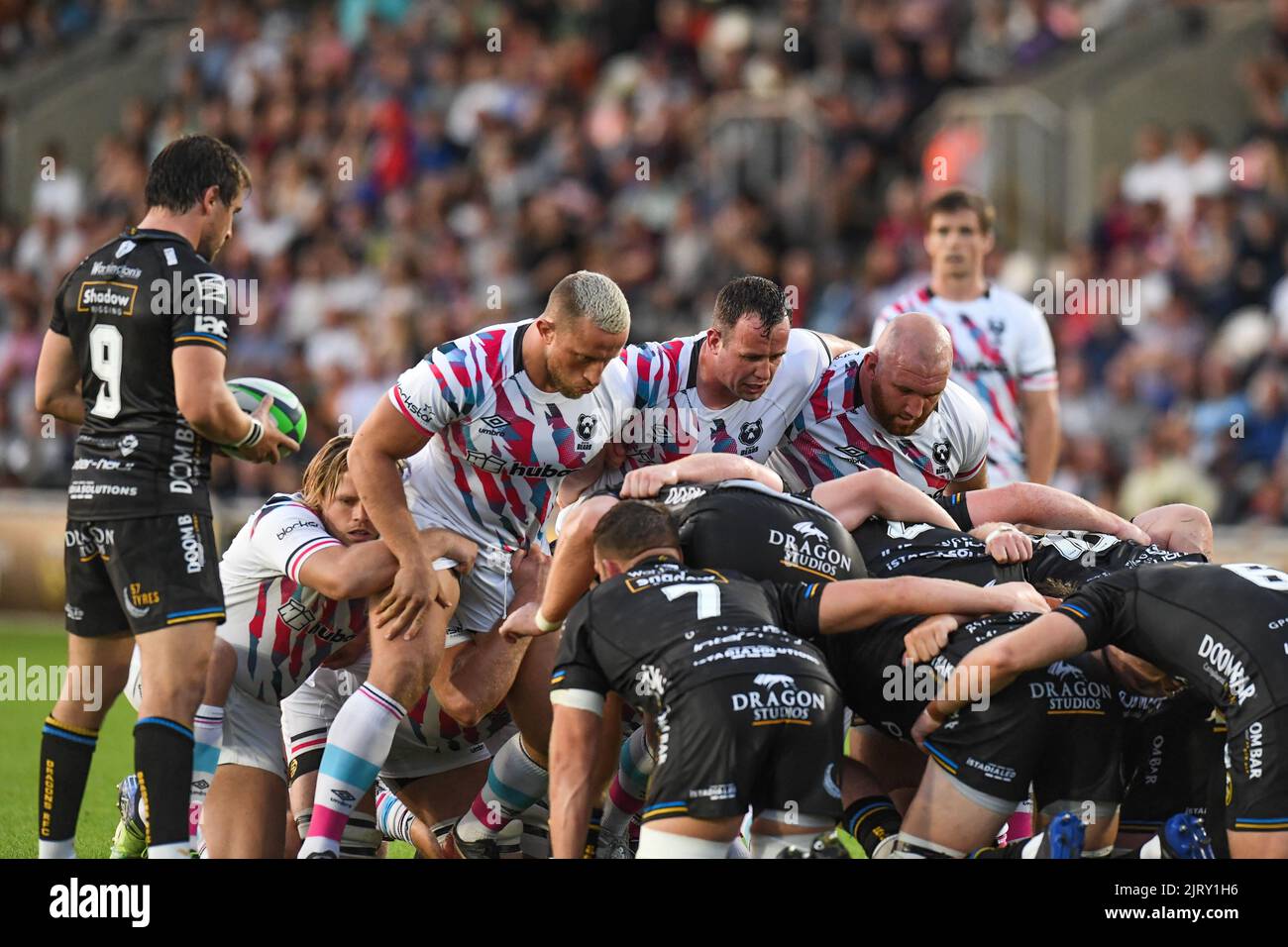 Bryan Byrne , Max Lahiff and Yann Thomas of Bristol Bears scrum down during the game Stock Photo