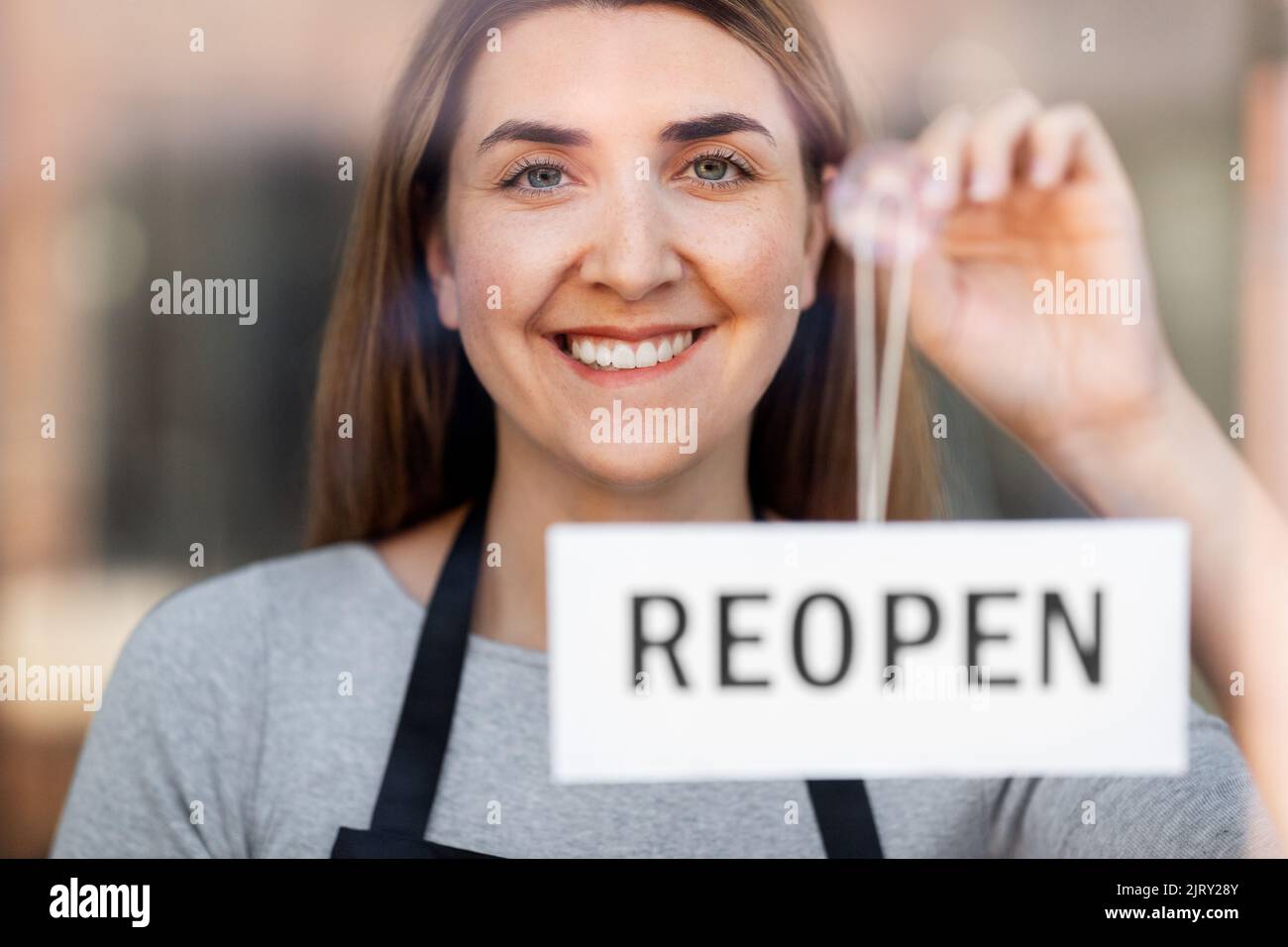 Reopening hanging sign hi-res stock photography and images - Alamy