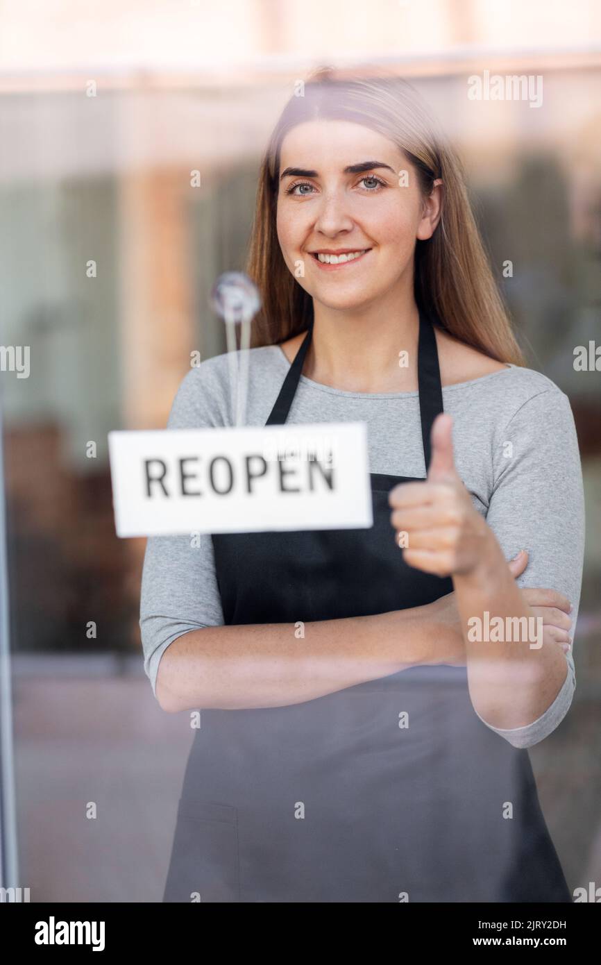 Reopening hanging sign hi-res stock photography and images - Alamy