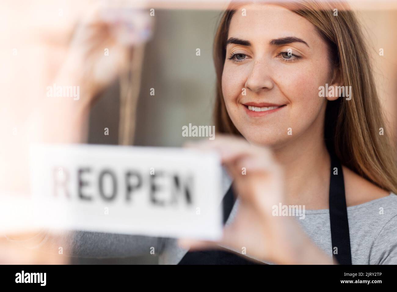 Reopening hanging sign hi-res stock photography and images - Alamy