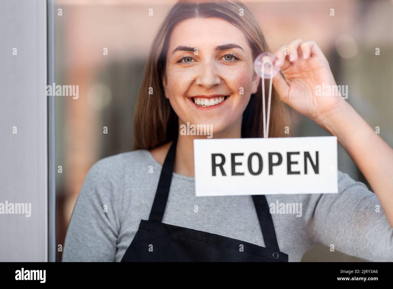 Happy woman hanging reopen hi-res stock photography and images - Alamy