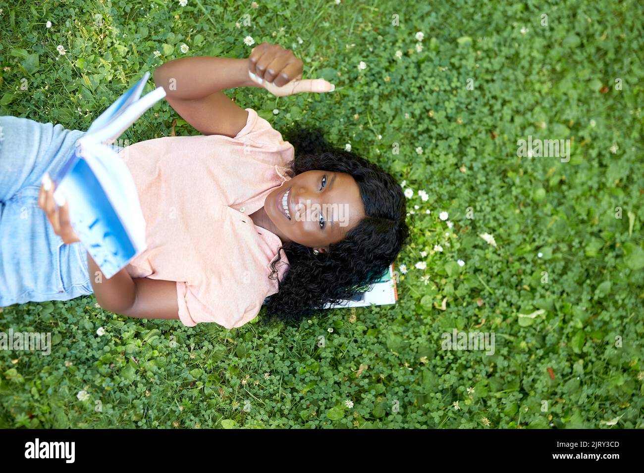 african student girl reading math textbook Stock Photo Alamy