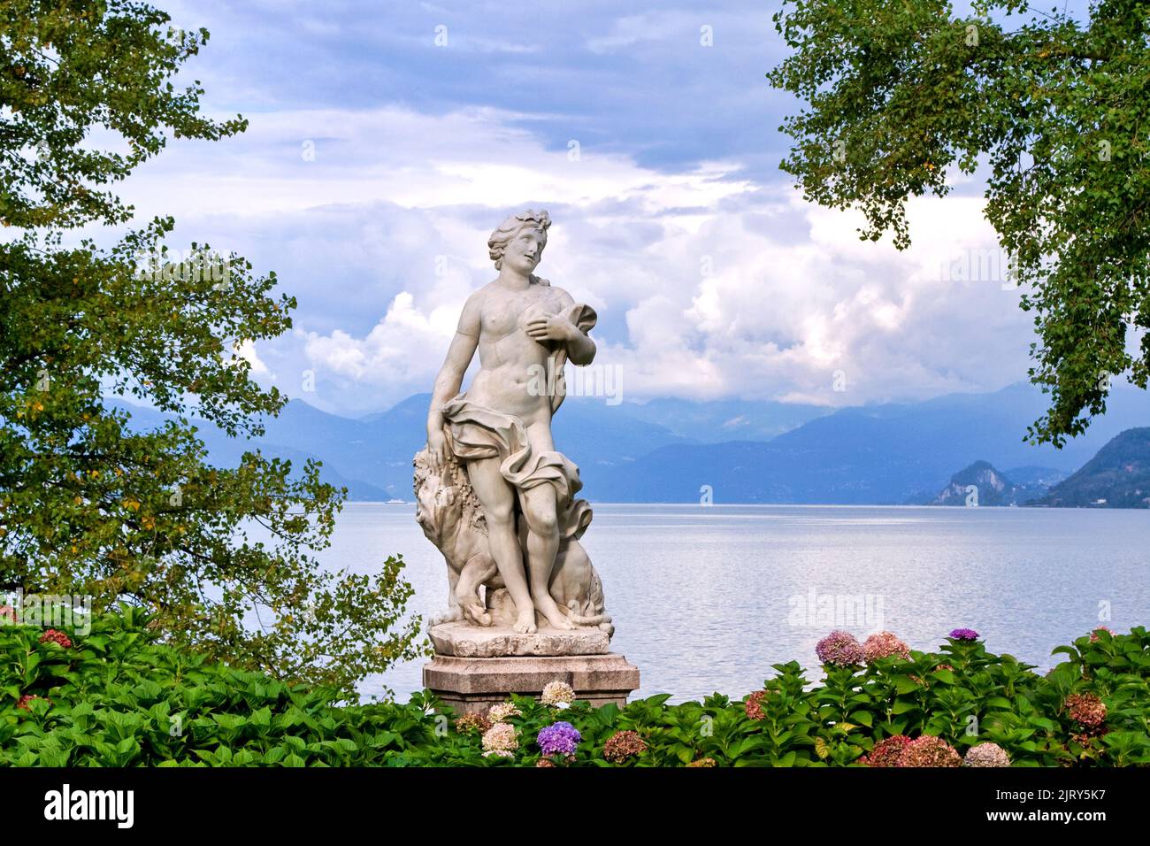 Marble statue overlooking Lake Maggiore, Italy Stock Photo