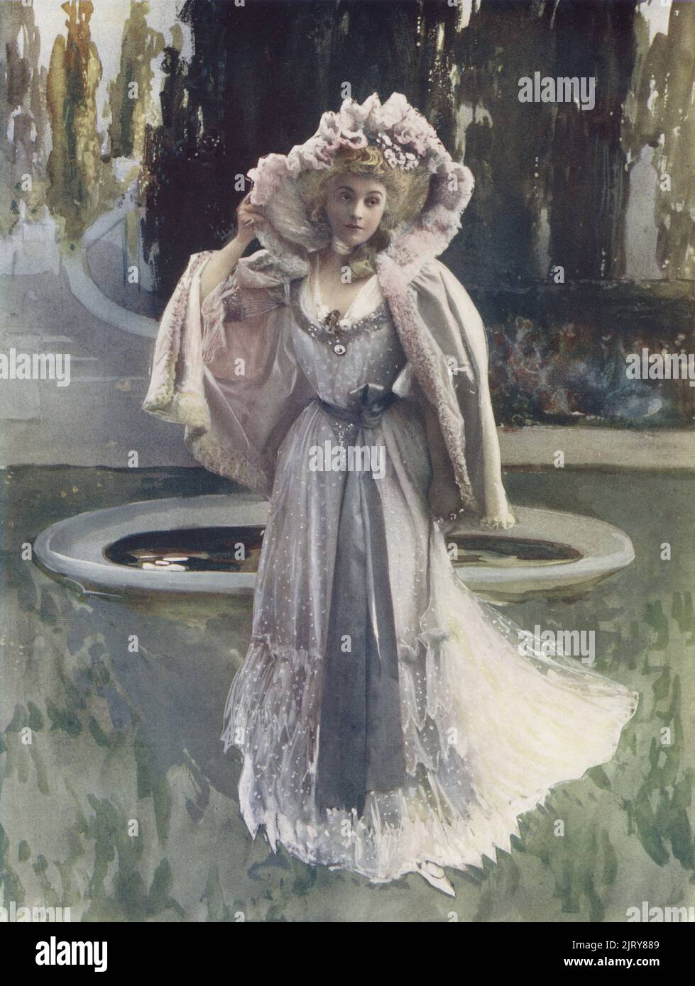 Mme. Gabrielle Rejane in Sylvie, ou la Curieuse d'amour, a stage play by Abel Hermant, music by Edmond Laurens, 1900. Gabrielle Charlotte Reju, French stage and film actress, 1856-1920. Photo by Leopold Emile Reutlinger. Colour printing of a hand-coloured illustration based on a monochrome photograph from George Newnes’s Players of the Day, London, 1905. Stock Photo